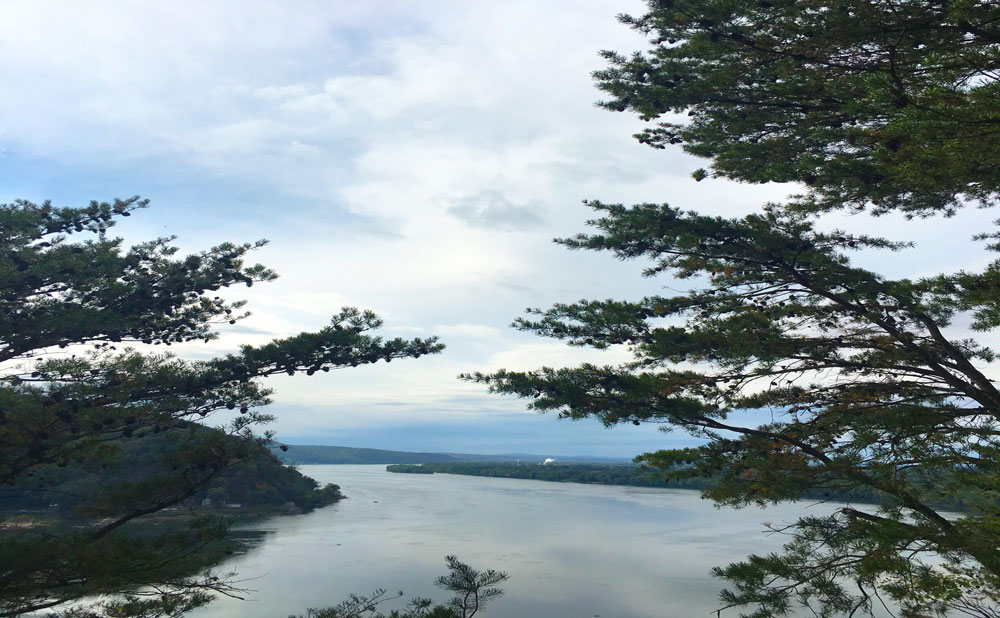 A photo from the hills looking over a river